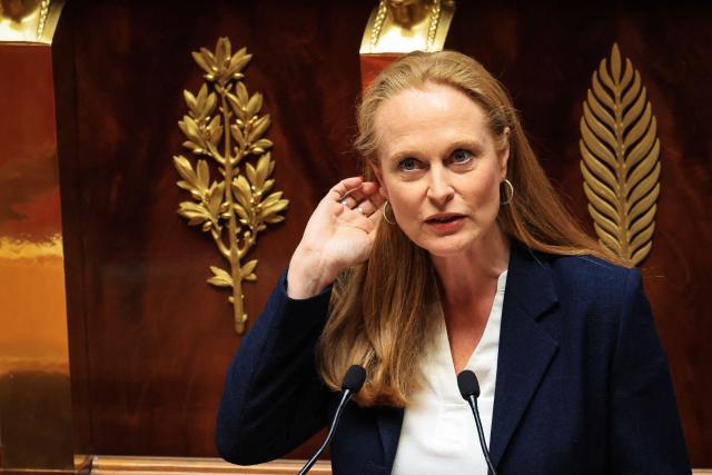 Ensemble Pour la Republique's MP Violette Spillebout speaks on stage to present the text ahead of the debate on child protection and on tackling violence in schools at the National Assembly, France's Parliament lower house, in Paris on June 1, 2026. (Photo by Ludovic MARIN / AFP)