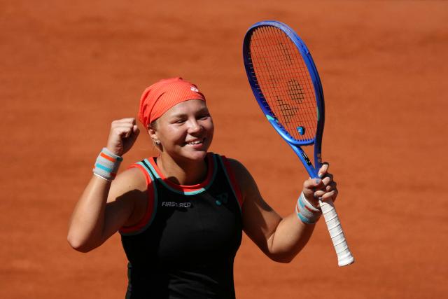 Diana Shnaider celebrates her victory over US Madison Keys at the end of their women's singles match on day 9 of the French Open tennis tournament on Court Suzanne-Lenglen at the Roland-Garros Complex in Paris on June 1, 2026. (Photo by Dimitar DILKOFF / AFP)