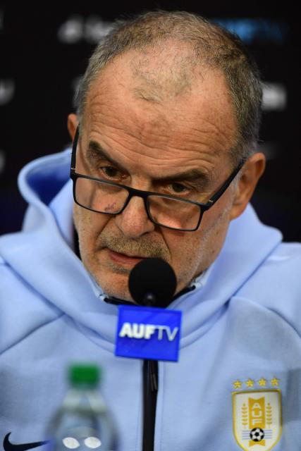 Uruguay's national football team coach, Argentine Marcelo Bielsa, speaks during a press conference in Barros Blancos, Canelones department, Uruguay on June 1, 2026. Led by Federico Valverde and with the long-awaited inclusion of veteran goalkeeper Fernando Mulsera, Marcelo Bielsa on May 31 made official the list of 26 players who will represent La Celeste at the World Cup, which kicks off in ten days in North America. (Photo by Dante FERNANDEZ / AFP)
