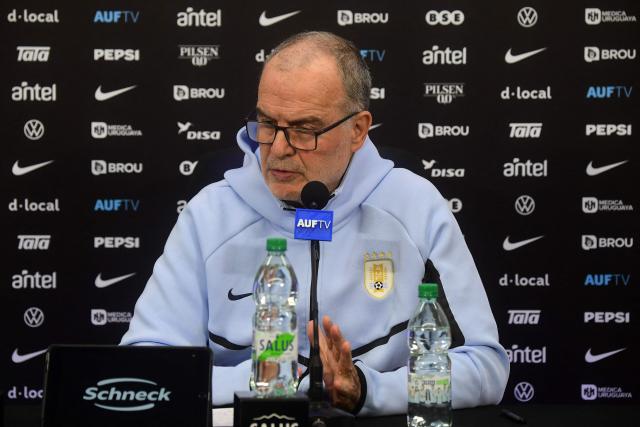 Uruguay's national football team coach, Argentine Marcelo Bielsa, speaks during a press conference in Barros Blancos, Canelones department, Uruguay on June 1, 2026. Led by Federico Valverde and with the long-awaited inclusion of veteran goalkeeper Fernando Mulsera, Marcelo Bielsa on May 31 made official the list of 26 players who will represent La Celeste at the World Cup, which kicks off in ten days in North America. (Photo by Dante FERNANDEZ / AFP)