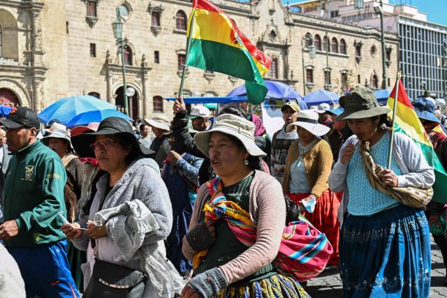 People take part in a protest march by neighborhood councils from El Alto calling for the resignation of President Rodrigo Paz, in La Paz on June 1, 2026. (Photo by AIZAR RALDES / AFP)