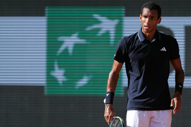 Canada's Felix Auger-Aliassime looks on as he plays against Chile's Alejandro Tabilo during their men's singles match on day 9 of the French Open tennis tournament on Court Philippe-Chatrier at the Roland-Garros Complex in Paris on June 1, 2026. (Photo by Thomas SAMSON / AFP)