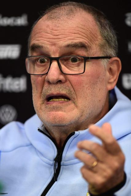 Uruguay's national football team coach, Argentine Marcelo Bielsa, gestures as he speaks during a press conference in Barros Blancos, Canelones department, Uruguay on June 1, 2026. Led by Federico Valverde and with the long-awaited inclusion of veteran goalkeeper Fernando Mulsera, Marcelo Bielsa on May 31 made official the list of 26 players who will represent La Celeste at the World Cup, which kicks off in ten days in North America. (Photo by Dante FERNANDEZ / AFP)