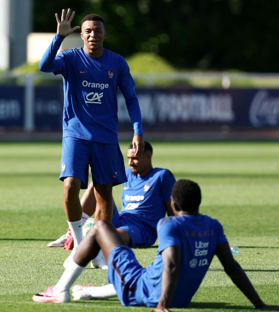 France's forward #10 Kylian Mbappe gestures as he takes part in a training session at the national team training grounds in Clairefontaine-en-Yvelines, southwest of Paris, on June 1, 2026, as part of their preparation for the upcoming 2026 FIFA World Cup football tournament. (Photo by FRANCK FIFE / AFP)