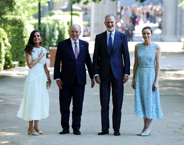 Spain's Felipe VI (2R), Queen Letizia (L), Prince Albert II of Monaco (2L) and Princess Charlene (R) attend the opening of an exhibition marking the 150th anniversary of the establishment of the first diplomatic mission between Spain and Monaco, in Madrid's Botanical Garden on June 1, 2026. (Photo by Thomas COEX / AFP)