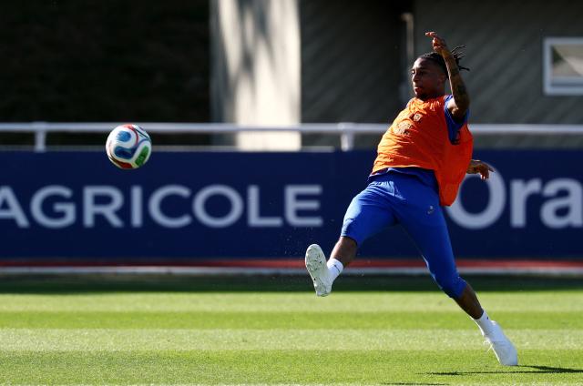 France's forward #11 Michael Olise kicks the ball during a training session at the national team training grounds in Clairefontaine-en-Yvelines, southwest of Paris, on June 1, 2026, as part of their preparation for the upcoming 2026 FIFA World Cup football tournament. (Photo by FRANCK FIFE / AFP)
