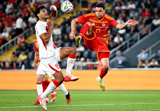 Turkey's defender #15 Ozan Kabak (L) vies with North Macedonia's midfielder #21 Jani Atanasov during the international friendly football match between Turkey and North Macedonia at the Chobani stadium in Istanbul on June 1, 2026, ahead of the 2026 FIFA World Cup. (Photo by Yasin AKGUL / AFP)