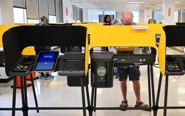 People vote at a polling location at the Los Angeles County Registrar during early voting in the state's primary election in Norwalk, California, on June 1, 2026. California will hold its primary election on June 2. In the gubernatorial race, the top two finishers, regardless of party, will advance to the general election. (Photo by Frederic J. BROWN / AFP)
