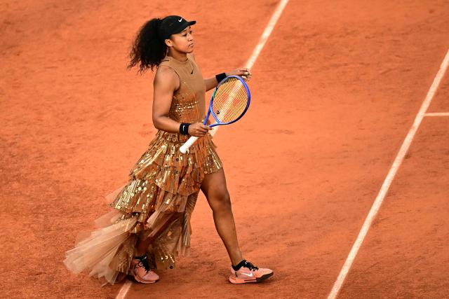 Japan's Naomi Osaka walks on Court Philippe-Chatrier ahead of her women's singles match against Aryna Sabalenka on day 9 of the French Open tennis tournament at the Roland-Garros Complex in Paris on June 1, 2026. (Photo by JULIEN DE ROSA / AFP)