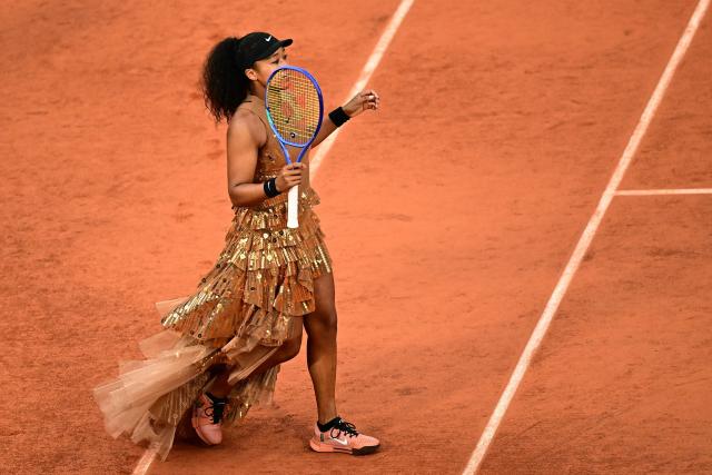 Japan's Naomi Osaka walks on Court Philippe-Chatrier ahead of her women's singles match against Aryna Sabalenka on day 9 of the French Open tennis tournament at the Roland-Garros Complex in Paris on June 1, 2026. (Photo by JULIEN DE ROSA / AFP)