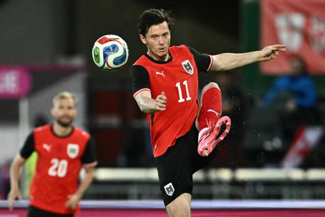 Austria's forward #11 Michael Gregoritsch controls the ball during the friendly football match between Austria and Tunisia in Vienna, Austria on June 1, 2026 ahead of the 2026 FIFA World Cup football tournament. (Photo by Joe Klamar / AFP)