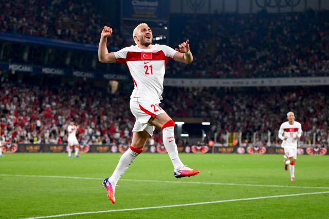Turkey's midfielder #21 Baris Yilmaz celebrates after scoring his team's fourth goal during the international friendly football match between Turkey and North Macedonia at the Chobani stadium in Istanbul on June 1, 2026, ahead of the 2026 FIFA World Cup. (Photo by Yasin AKGUL / AFP)