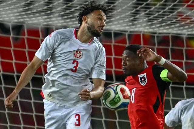 Austria's defender #08 David Alaba and Tunisia's defender #03 Montassar Talbi vie for the ball during the friendly football match between Austria and Tunisia in Vienna, Austria on June 1, 2026 ahead of the 2026 FIFA World Cup football tournament. (Photo by Joe Klamar / AFP) / ALTERNATIVE CROP