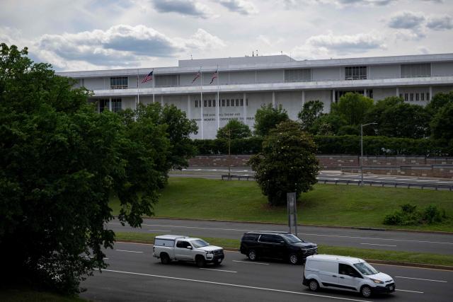 Cars drive near the Donald J. Trump and John F. Kennedy Memorial Center for the Performing Arts in Washington, DC, on June 1, 2026. A US judge on May 29, 2026, ruled that the famed Kennedy Center for the Performing Arts had been illegally renamed after President Donald Trump and that his name must be taken down. (Photo by Kent Nishimura / AFP)