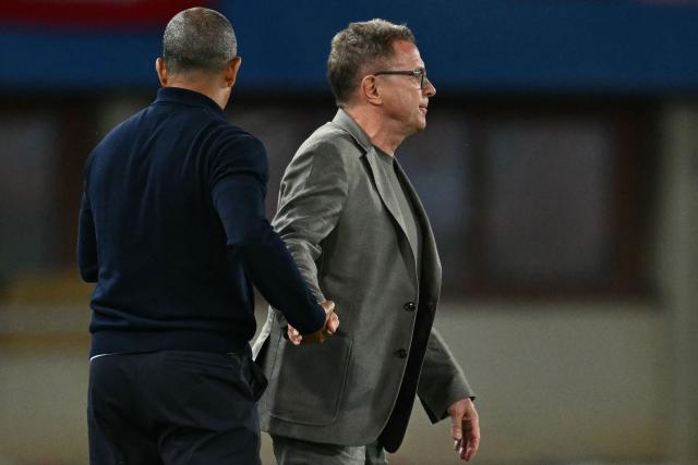 Austria's coach Ralf Rangnick (R) and Tunisia's French head coach Sabri Lamouchi shake hands during the friendly football match between Austria and Tunisia in Vienna, Austria on June 1, 2026 ahead of the 2026 FIFA World Cup football tournament. (Photo by Joe Klamar / AFP)