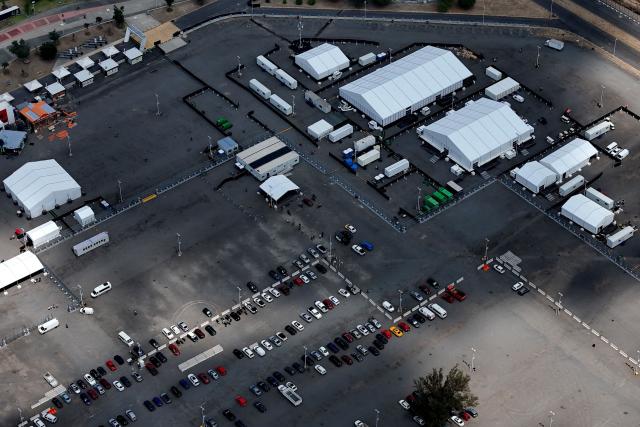 This aerial view shows the officials facilities set up at Guadalajara Stadium, renamed from "Akron Stadium" for the FIFA 2026 World Cup football tournament in Zapopan, Mexico on June 1, 2026. FIFA temporarily branded some stadium names for the FIFA 2026 World Cup football tournament, enforcing a strict "debranding" policy that requires all host stadiums to remove or cover non-official corporate sponsor names, suite branding, and external logos. (Photo by ULISES RUIZ / AFP)
