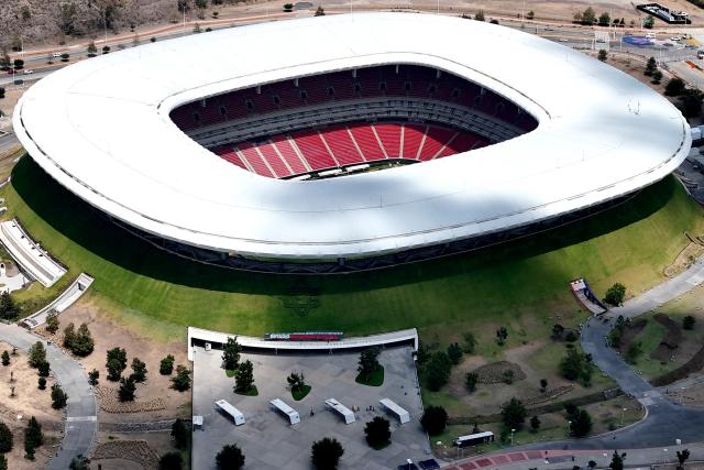This aerial view shows the Guadalajara Stadium, renamed from "Akron Stadium" for the FIFA 2026 World Cup football tournament in Zapopan, Mexico on June 1, 2026. FIFA temporarily branded some stadium names for the FIFA 2026 World Cup football tournament, enforcing a strict "debranding" policy that requires all host stadiums to remove or cover non-official corporate sponsor names, suite branding, and external logos. (Photo by ULISES RUIZ / AFP)