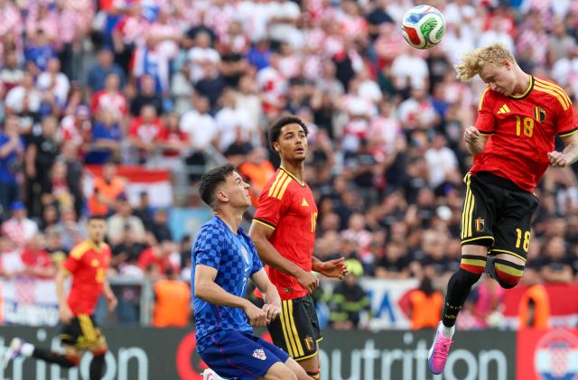 Belgium's midfielder #18 Joaquin Seys heads the ball as Belgium's defender #16 Koni De Winter (C) and Croatia's midfielder #07 Nikola Moro (L) during the international friendly football match between Croatia and Belgium ahead of the 2026 FIFA World Cup football tournament at the Rujevica Stadium in Rijeka on June 2, 2026. (Photo by MARKO PERKOV / AFP)