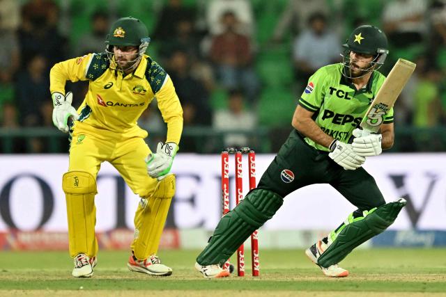 Pakistan's Arafat Minhas (R) plays a shot during the second one-day international (ODI) cricket match between Pakistan and Australia at Gaddafi Stadium in Lahore on June 2, 2026. (Photo by Arif ALI / AFP)