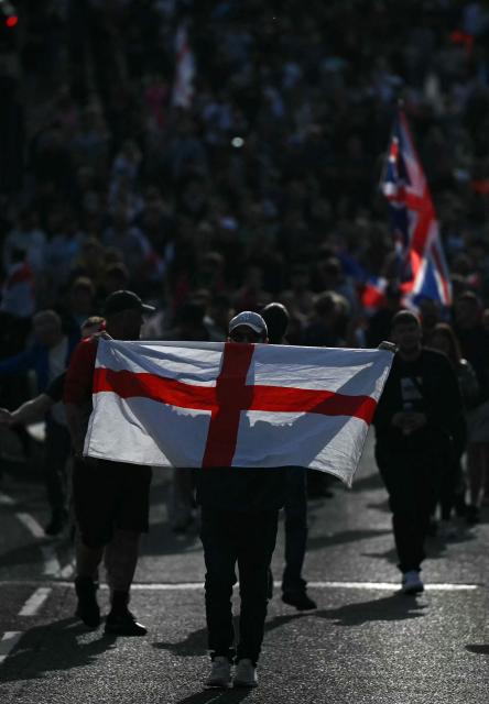 Demonstrators take part in a protest march over the Police's handling of the detention of victim Henry Nowak, as they leave outside Southampton Central Police Station in Southampton, southern England, on June 2, 2026, following the conviction of his murderer Vickrum Digwa. Body camera footage of dying student Henry Nowak, who was handcuffed by British police after being stabbed by Sikh man Vickrum Digwa, and falsely accused of racially abusing his murderer sparked outrage Tuesday. (Photo by JUSTIN TALLIS / AFP)