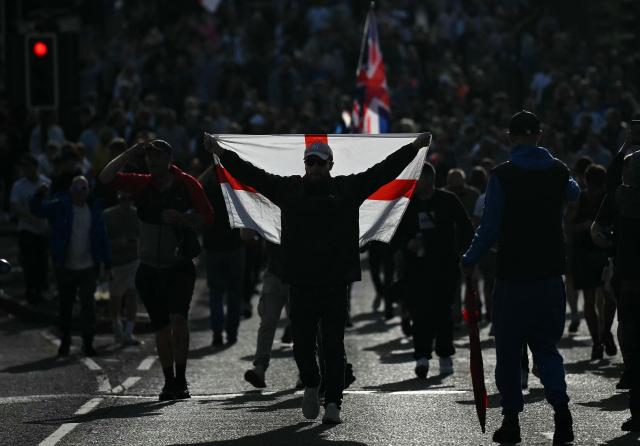 Demonstrators take part in a protest march over the Police's handling of the detention of victim Henry Nowak, as they leave outside Southampton Central Police Station in Southampton, southern England, on June 2, 2026, following the conviction of his murderer Vickrum Digwa. Body camera footage of dying student Henry Nowak, who was handcuffed by British police after being stabbed by Sikh man Vickrum Digwa, and falsely accused of racially abusing his murderer sparked outrage Tuesday. (Photo by JUSTIN TALLIS / AFP)