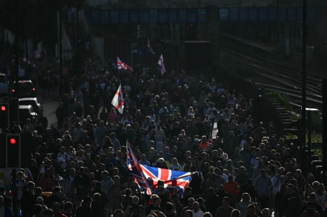 Demonstrators take part in a protest march over the Police's handling of the detention of victim Henry Nowak, as they leave outside Southampton Central Police Station in Southampton, southern England, on June 2, 2026, following the conviction of his murderer Vickrum Digwa. Body camera footage of dying student Henry Nowak, who was handcuffed by British police after being stabbed by Sikh man Vickrum Digwa, and falsely accused of racially abusing his murderer sparked outrage Tuesday. (Photo by JUSTIN TALLIS / AFP)