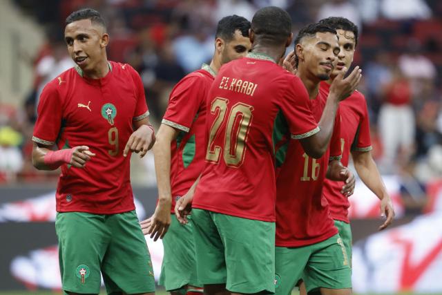 Morocco's player #09 Soufiane Rahimi (L) celebrates with teammates after scoring his team's third goal during the friendly football match between Morocco and Madagascar at the Prince Moulay Abdellah Stadium in Rabat on June 2, 2026. (Photo by Abdel Majid BZIOUAT / AFP)