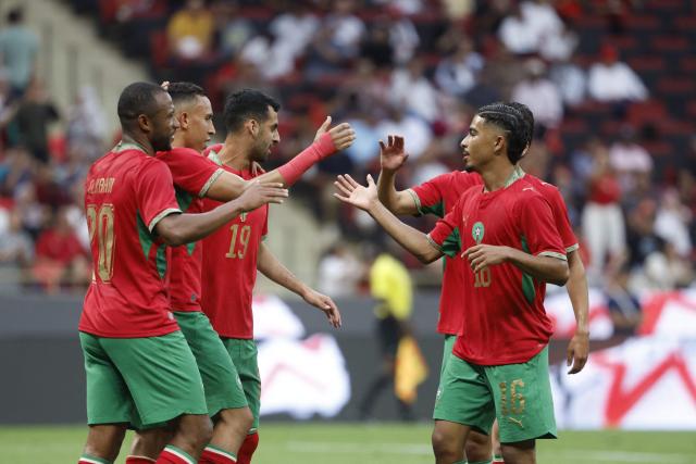 Morocco's player #09 Soufiane Rahimi (2nd L) celebrates with teammates after scoring his team's third goal during the friendly football match between Morocco and Madagascar at the Prince Moulay Abdellah Stadium in Rabat on June 2, 2026. (Photo by Abdel Majid BZIOUAT / AFP)