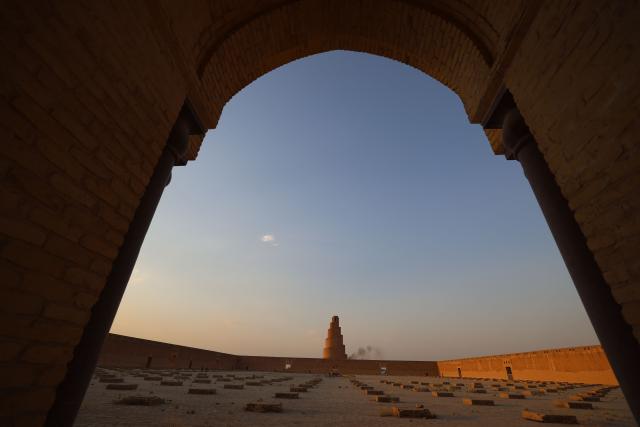 This picture shows the ancient Mosque of Samarra and Malwiya minaret in the city of Samarra, north of the Iraqi capital Baghdad on June 2, 2026. The Malwiya Mosque, also known as the Great Mosque of Samarra, is one of the oldest and most prominent Islamic mosques in Iraq. It was built by the Abbasid Caliph al-Mutawakkil between 848 and 851 CE. It gained international fame for its unique spiral minaret, considered an architectural masterpiece. The mosque is located in the city of Samarra, in the Salah ad-Din Governorate (approximately 125 km north of Baghdad). The mosque and its minaret are an integral part of the ancient city of Samarra, a UNESCO World Heritage Site. (Photo by AHMAD AL-RUBAYE / AFP)