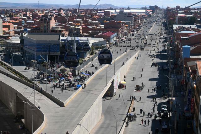 Anti-government demonstrators hold a road blockade in the Rio Seco area of El Alto, Bolivia, on June 2, 2026, following days of protests amid growing political tensions and supply shortages affecting different regions of the country. Since last May, workers, peasants, miners, transport workers, and teachers have been calling for urgent action to confront the country’s most severe economic crisis in forty years, and their demands include concrete economic measures as well as the resignation of President Rodrigo Paz. (Photo by Marvin RECINOS / AFP)