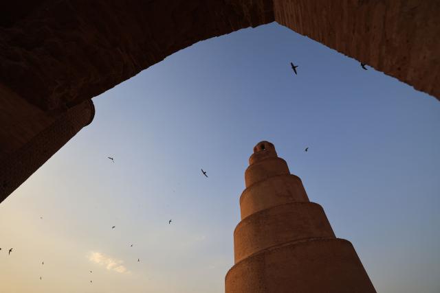 This picture shows the ancient Mosque of Samarra's Malwiya minaret in the city of Samarra, north of the Iraqi capital Baghdad on June 2, 2026. The Malwiya Mosque, also known as the Great Mosque of Samarra, is one of the oldest and most prominent Islamic mosques in Iraq. It was built by the Abbasid Caliph al-Mutawakkil between 848 and 851 CE. It gained international fame for its unique spiral minaret, considered an architectural masterpiece. The mosque is located in the city of Samarra, in the Salah ad-Din Governorate (approximately 125 km north of Baghdad). The mosque and its minaret are an integral part of the ancient city of Samarra, a UNESCO World Heritage Site. (Photo by AHMAD AL-RUBAYE / AFP)