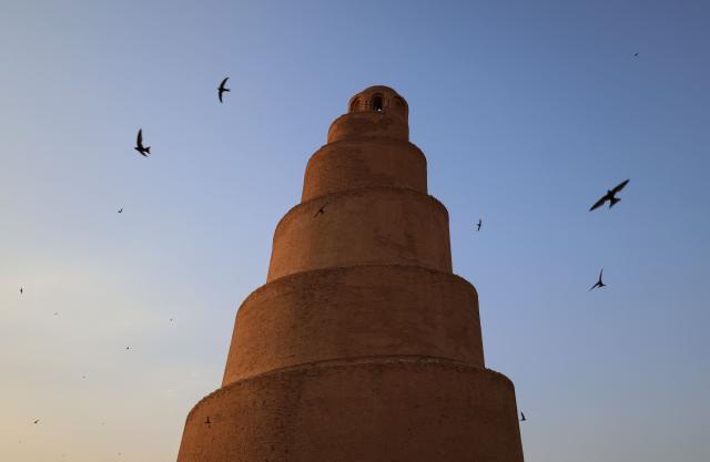 This picture shows the ancient Mosque of Samarra's Malwiya minaret in the city of Samarra, north of the Iraqi capital Baghdad on June 2, 2026. The Malwiya Mosque, also known as the Great Mosque of Samarra, is one of the oldest and most prominent Islamic mosques in Iraq. It was built by the Abbasid Caliph al-Mutawakkil between 848 and 851 CE. It gained international fame for its unique spiral minaret, considered an architectural masterpiece. The mosque is located in the city of Samarra, in the Salah ad-Din Governorate (approximately 125 km north of Baghdad). The mosque and its minaret are an integral part of the ancient city of Samarra, a UNESCO World Heritage Site. (Photo by AHMAD AL-RUBAYE / AFP)