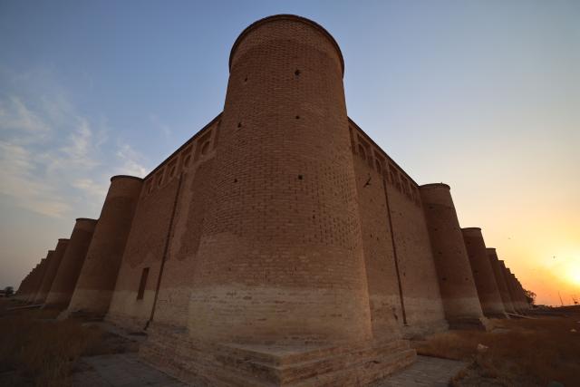 This picture shows the outside of the ancient Mosque of Samarra in the city of Samarra, north of the Iraqi capital Baghdad on June 2, 2026. The Malwiya Mosque, also known as the Great Mosque of Samarra, is one of the oldest and most prominent Islamic mosques in Iraq. It was built by the Abbasid Caliph al-Mutawakkil between 848 and 851 CE. It gained international fame for its unique spiral minaret, considered an architectural masterpiece. The mosque is located in the city of Samarra, in the Salah ad-Din Governorate (approximately 125 km north of Baghdad). The mosque and its minaret are an integral part of the ancient city of Samarra, a UNESCO World Heritage Site. (Photo by AHMAD AL-RUBAYE / AFP)