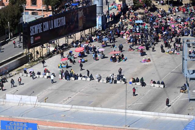 Anti-government demonstrators hold a road blockade in the La Ceja area of El Alto, Bolivia, on June 2, 2026, following days of protests amid growing political tensions and supply shortages affecting different regions of the country. Since last May, workers, peasants, miners, transport workers, and teachers have been calling for urgent action to confront the country’s most severe economic crisis in forty years, and their demands include concrete economic measures as well as the resignation of President Rodrigo Paz. (Photo by Marvin RECINOS / AFP)