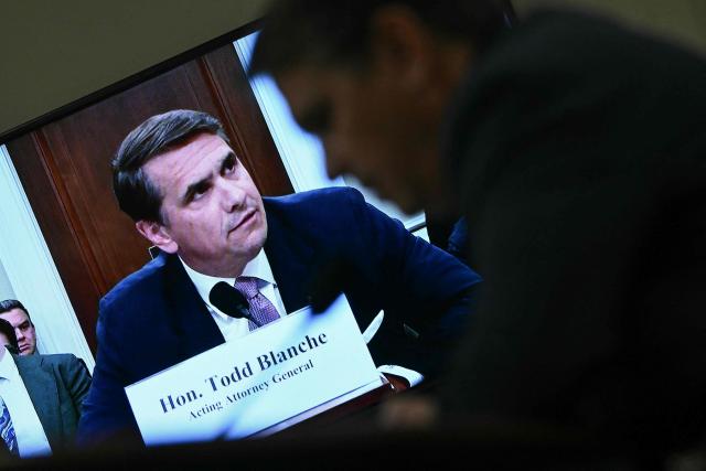 Acting US Attorney General Todd Blanche is seen on a TV screen as he testifies at House Appropriations Committee Commerce, Justice, Science, and Related Agencies Subcommittee hearing on oversight of the Department of Justice, on Capitol Hill in Washington, DC, on June 2, 2026. (Photo by Brendan SMIALOWSKI / AFP)