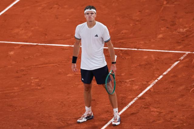 Czech Republic's Jakub Mensik celebrates after winning against Brazil's Joao Fonseca at the end of their men's quarter final singles match on day 10 of the French Open tennis tournament on Court Philippe-Chatrier at the Roland-Garros Complex in Paris on June 2, 2026. (Photo by Anne-Christine POUJOULAT / AFP)