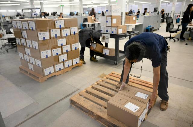 Boxes of ballots are unloaded at the Los Angeles County Ballot Processing Center during California's state primary election in the City of Industry, California, on June 2, 2026. Californians go to the polls Tuesday in the first round of voting for a new governor, with a tight three-way race for two run-off spots, while people in Los Angeles will also be voting for a new mayor. The state's so-called "jungle primary" pits all comers against each other -- regardless of party -- with the top two vote-getters advancing to the November general election to replace term-limited Governor Gavin Newsom. (Photo by Patrick T. Fallon / AFP)