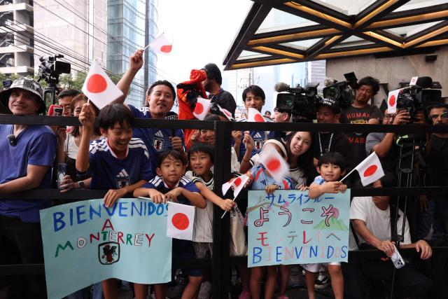 Japanese fans show welcome signs for the arrival of Japan's players in Monterrey, Mexico on June 2, 2026, ahead of the FIFA 2026 World Cup football tournament. (Photo by Julio Cesar AGUILAR / AFP)