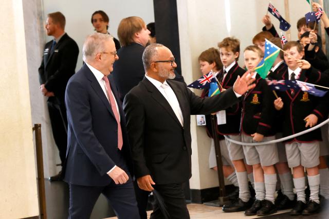 Solomon Islands Prime Minister Matthew Wale (R) talks with Australia’s Prime Minister Anthony Albanese at Parliament House in Canberra on June 3, 2026. (Photo by Hilary Wardhaugh / AFP)