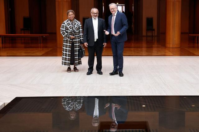 Solomon Islands Prime Minister Matthew Wale (C) and his wife Veronica Ruala Waletofea talk with Australia’s Prime Minister Anthony Albanese (R) at Parliament House in Canberra on June 3, 2026. (Photo by Hilary Wardhaugh / AFP)