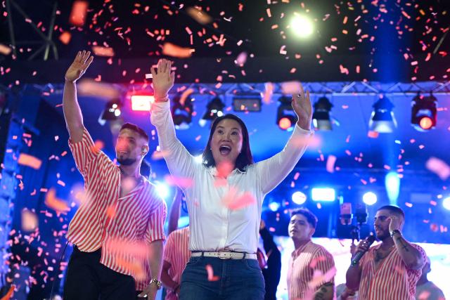 Peru's presidential candidate for the Fuerza Popular party, Keiko Fujimori, waves during a campaign rally in Huacho, north of Lima, Peru, on June 2, 2026. Peruvians will choose on June 7, 2026 their president from between the right-wing Keiko Fujimori, heir to a political dynasty that divides the nation, and the left-wing Roberto Sánchez: two diametrically opposed visions for a country plagued by instability and crime. (Photo by ERNESTO BENAVIDES / AFP)