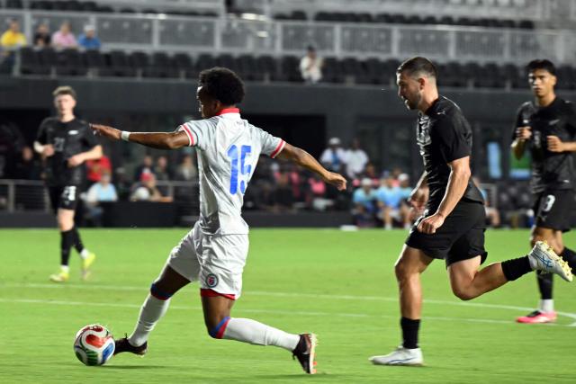 Haiti's forward #15 Ruben Providence (L) controls the ball prior to score a goal during an international friendly football match between Haiti and New Zealand at Chase Stadium in Fort Lauderdale, Florida, on June 2, 2026. (Photo by CHANDAN KHANNA / AFP)