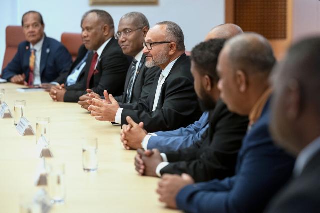 Solomon Islands' Prime Minister Matthew Wale (C) attends a meeting with Australia’s Prime Minister Anthony Albanese at Parliament House in Canberra on June 3, 2026. (Photo by Hilary Wardhaugh / AFP)