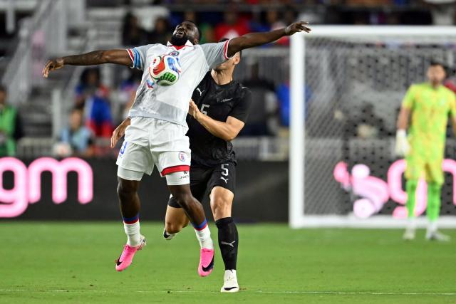 Haiti's forward #20 Frantzdy Pierrot (L) and New Zealand's defender #05 Michael Boxall fight for the ball during an international friendly football match between Haiti and New Zealand at Chase Stadium in Fort Lauderdale, Florida on June 2, 2026. (Photo by CHANDAN KHANNA / AFP)