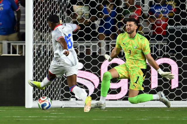 Haiti's forward #16 Lenny Joseph (L) shoots to score a goal against New Zealand's goalkeeper #01 Max Crocomb during an international friendly football match between Haiti and New Zealand at Inter Miami CF Stadium in Fort Lauderdale, Florida on June 2, 2026. (Photo by CHANDAN KHANNA / AFP)