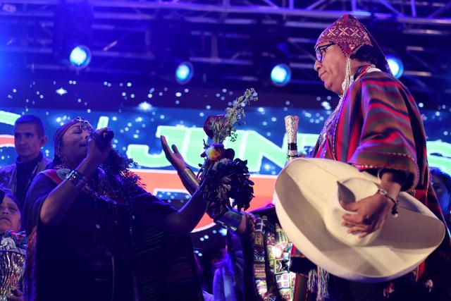 Peru's presidential candidate for the Juntos por el Peru party, Roberto Sanchez, takes part in a cleansing ritual during a campaign rally at the Plaza Tupac Amaru in Cusco, Peru, on June 2, 2026. Peruvians will choose their president on June 7, 2026, between right-wing candidate Keiko Fujimori, heir to a political dynasty that divides the nation, and left-wing candidate Roberto Sбnchez—two diametrically opposed visions for a country plagued by instability and crime. (Photo by Jose Angulo / AFP)