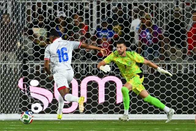 Haiti's forward #16 Lenny Joseph controls the ball and challenge New Zealand's goalkeeper #01 Max Crocomb to score a goal during an international friendly football match between Haiti and New Zealand at Inter Miami CF Stadium in Fort Lauderdale, Florida on June 2, 2026. (Photo by CHANDAN KHANNA / AFP)