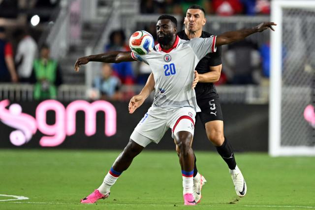 Haiti's forward #20 Frantzdy Pierrot and New Zealand's defender #05 Michael Boxall fight for the ball during an international friendly football match between Haiti and New Zealand at Inter Miami CF Stadium in Fort Lauderdale, Florida on June 2, 2026. (Photo by CHANDAN KHANNA / AFP)