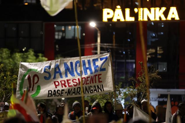 Supporters of Peru's presidential candidate for the Juntos por el Peru party, Roberto Sanchezshow a sign during a campaign rally at the Plaza Tupac Amaru in Cusco, Peru, on June 2, 2026. Peruvians will choose their president on June 7, 2026, between right-wing candidate Keiko Fujimori, heir to a political dynasty that divides the nation, and left-wing candidate Roberto Sбnchez—two diametrically opposed visions for a country plagued by instability and crime. (Photo by Jose Angulo / AFP)