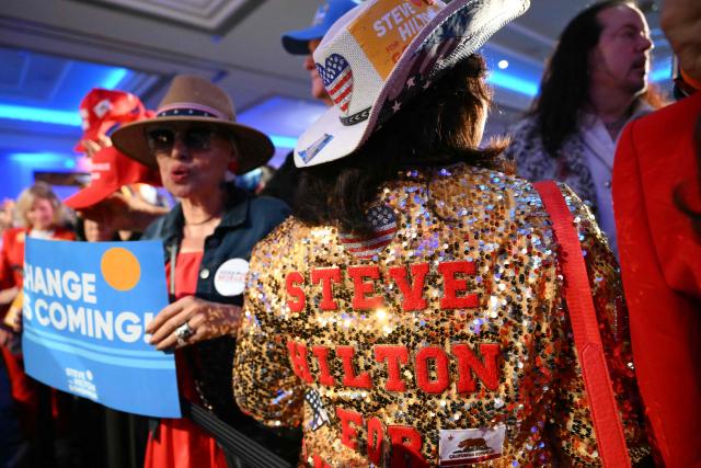 Supporters of Republican California Gubernatorial candidate Steve Hilton attend his election night event in Huntington Beach, California, on June 2, 2026. Californians went to the polls Tuesday in the first round of voting for a new governor, with a tight three-way race for two run-off spots, while people in Los Angeles will also be voting for a new mayor. The state's so-called "jungle primary" pits all comers against each other -- regardless of party -- with the top two vote-getters advancing to the November general election to replace term-limited Governor Gavin Newsom. (Photo by Patrick T. Fallon / AFP)